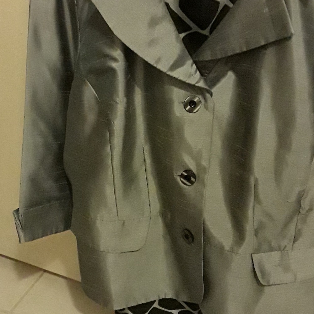 Silver and black two piece suit. Cuffed sleeves